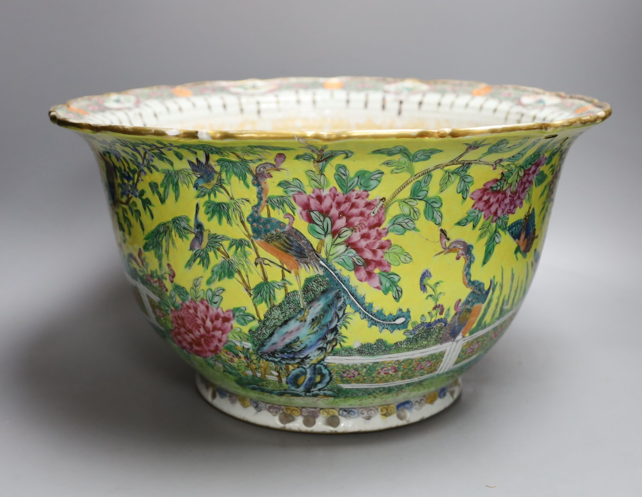 A Chinese yellow ground flower pot, early 20th century, 38cm diameter